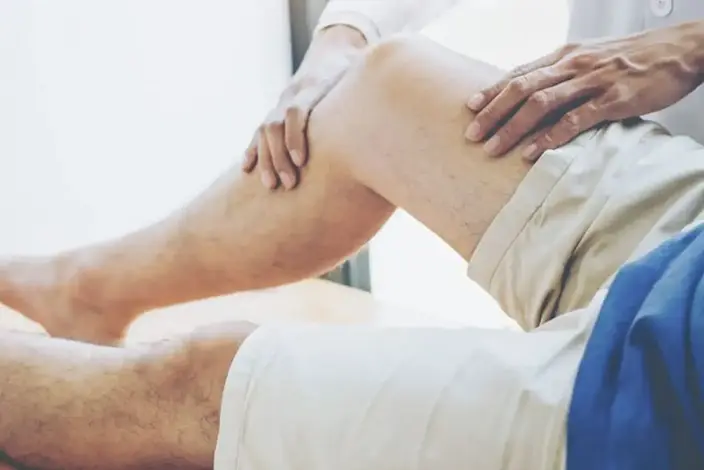 a man with a knee injury