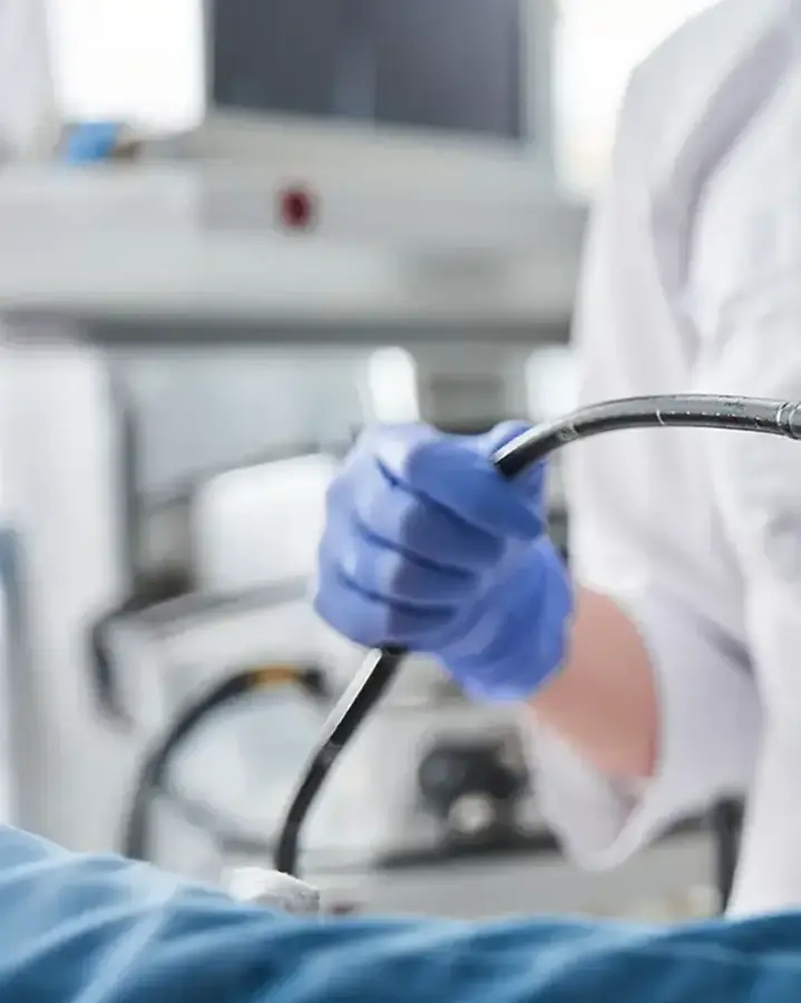 doctor holding endoscopy tube