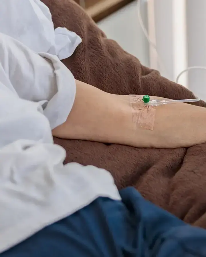 a nurse is checking the blood of a patient