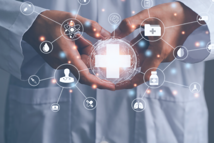 doctors-hands-with-medical-graphics