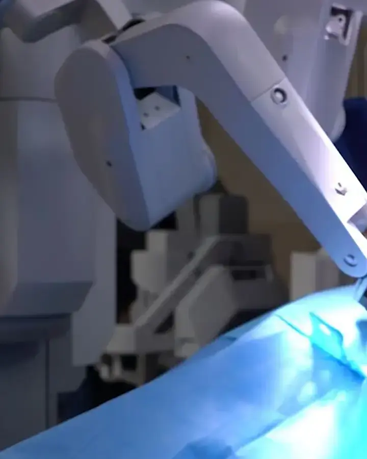 a surgeon operating a patient in a hospital